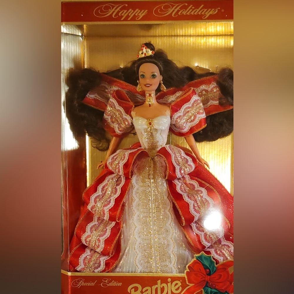Elegant Red and White Doll with Gold Accents